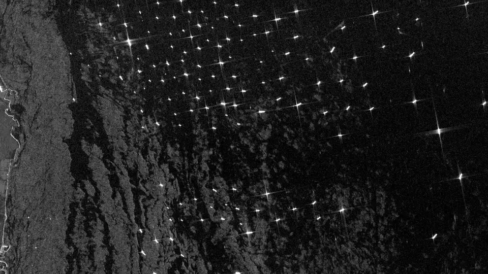The Fujairah anchorage on Sentinel-1 radar, 13 October 2026: each bright point a ship at anchor